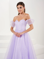 This dress features a strapless sweetheart neckline with a corset bodice, an A-line silhouette, removable puff sleeves, and glitter tulle fabric. This dress gives fairy-tale vibes and could be your dream dress at your next prom or formal event.   HOW 16083