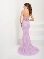 This dress features a slight scoop neckline with spaghetti straps and an open lace-up back, a sheer bodice with corset boning, a fitted silhouette, and beaded embellished tulle fabric. This dress is subtle glam and can be styled to make it your own at your next prom or formal event.  HOW 16102