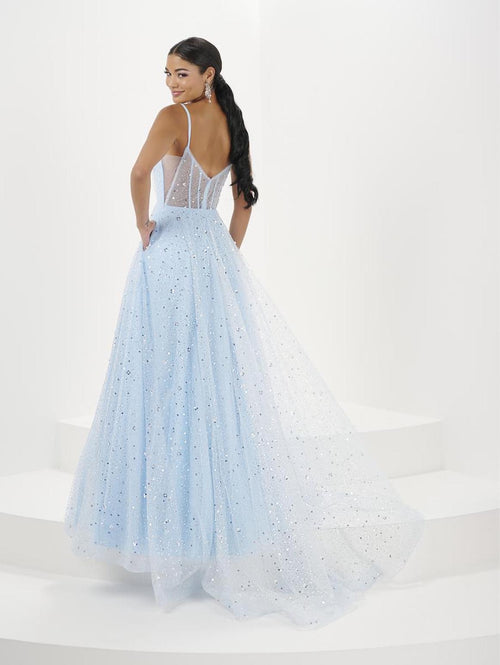 This dress features a v-neckline with spaghetti straps, sequin-adorned tulle fabric with an A-line silhouette. This dress is an enchanting choice for your next prom or formal event.  HOW 16066