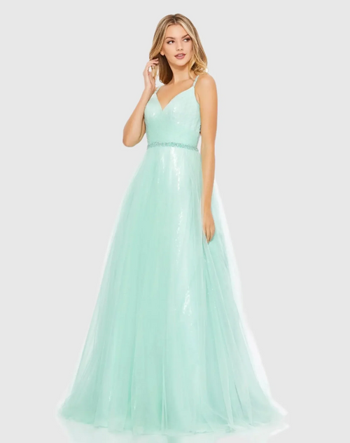 This dress features clear sequin-covered fabric topped with tulle. It’s styled with a surplice neckline, delicate embellished straps, a beaded waist, and a stunning crisscross back made from sheer tulle. Style this dress to make it your own at your next prom or formal event.

Mac Duggal 67565