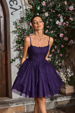 This cocktail dress features a straight across neckline with spaghetti straps and a lace-up back. The bodice is adorned with lace and the skirt has tiered glitter tulle fabric. This is a glamorous choice for your next homecoming or formal event.

JAD J26071