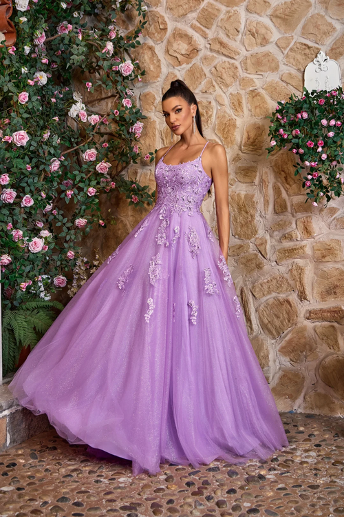 The dress features a boat neckline with spaghetti straps and a lace-up back. The bodice has lace detailing trickling into the skirt with a full glitter tulle skirt. This is a romantic choice for your next prom or formal event.

JAD J26010