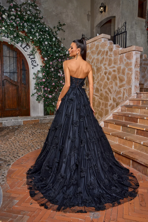 The ballgown features a semi-sweetheart strapless neckline with a lace-up back and 3D flowers scattered throughout the fabric design. This dress is dramatic and romantic and could be ideal for your next prom or formal event.

JAD J26020