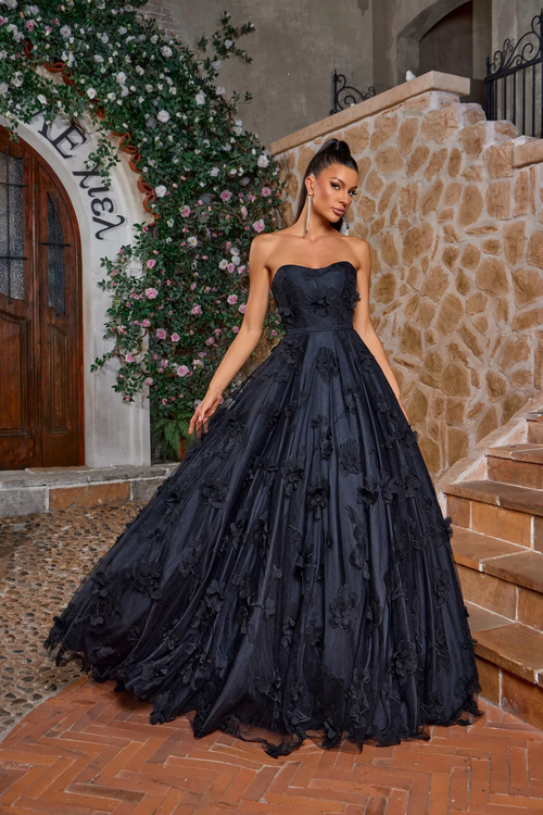The ballgown features a semi-sweetheart strapless neckline with a lace-up back and 3D flowers scattered throughout the fabric design. This dress is dramatic and romantic and could be ideal for your next prom or formal event.

JAD J26020