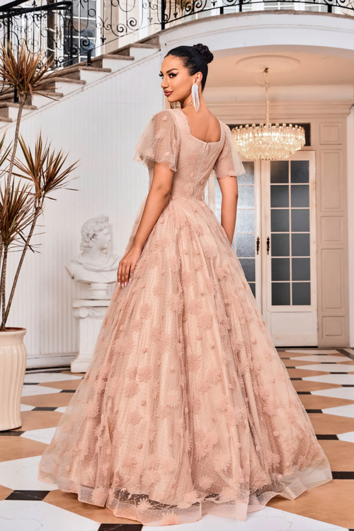 This modest dress features a square neckline with butterfly sleeves, fabric with 3D floral detailing, and an A-line silhouette. This gown is a great option if you are looking for a dress with a bit more coverage but don't want to sacrifice style. This is an elegant and modern choice.   JAD J24008