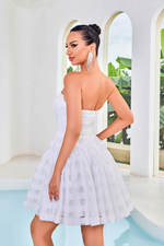 This cocktail dress features a strapless neckline with an A-line silhouette and a unique lace stripe fabric. This dress could be ideal for your next homecoming, sweethearts or formal event.  JAD J24092
