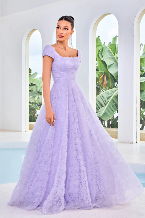 This dress features a square neckline with cap sleeves, an A-line silhouette with 3D floral fabric. This dress is ethereal and could be a great choice if you want a more modest prom dress. It has great coverage without sacrificing style.   JAD J24044