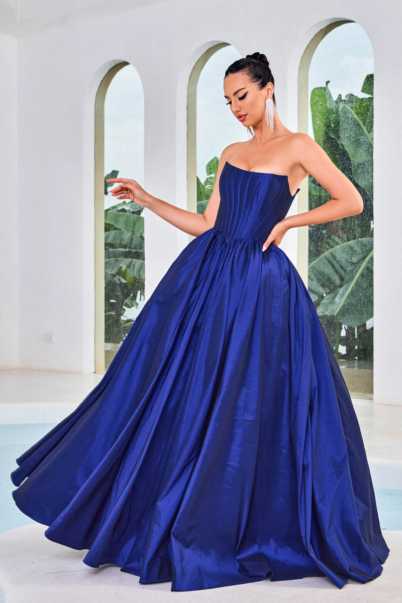 This ballgown features a strapless neckline with a corset bodice, a lace-up back, and taffeta fabric. This dress is a stunning choice for your next prom or formal event.  JAD J24033