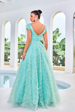 This dress features a square neckline with cap sleeves, an A-line silhouette with 3D floral fabric. This dress is ethereal and could be a great choice if you want a more modest prom dress. It has great coverage without sacrificing style.   JAD J24044