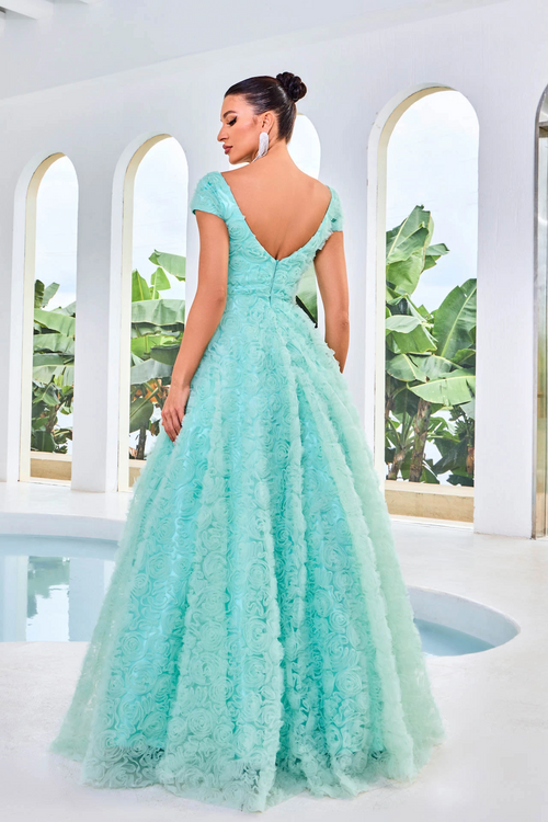This dress features a square neckline with cap sleeves, an A-line silhouette with 3D floral fabric. This dress is ethereal and could be a great choice if you want a more modest prom dress. It has great coverage without sacrificing style.   JAD J24044