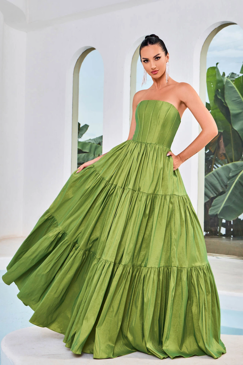 This dress features a strapless neckline, a corset bodice with exposed boning, an A-line silhouette, and taffeta fabric. This dress is simple and unique. You can style this dress for your prom in multiple ways and put your own twist on this look.  JAD J24011
