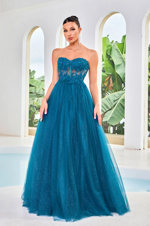 This dress features a strapless sweetheart neckline, a bodice with corset boning and lace applique, glitter tulle fabric skirt and an A-line silhouette with a lace-up back. This dress is elegant and could be perfect for your next prom or formal event.  JAD J24016