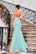 This dress features a v-neckline with spaghetti straps, a floral sequin embellished tulle fabric and a mermaid silhouette. This dress is glamourous and could be styled to make it your own at your next prom or formal event.   JAD J24031