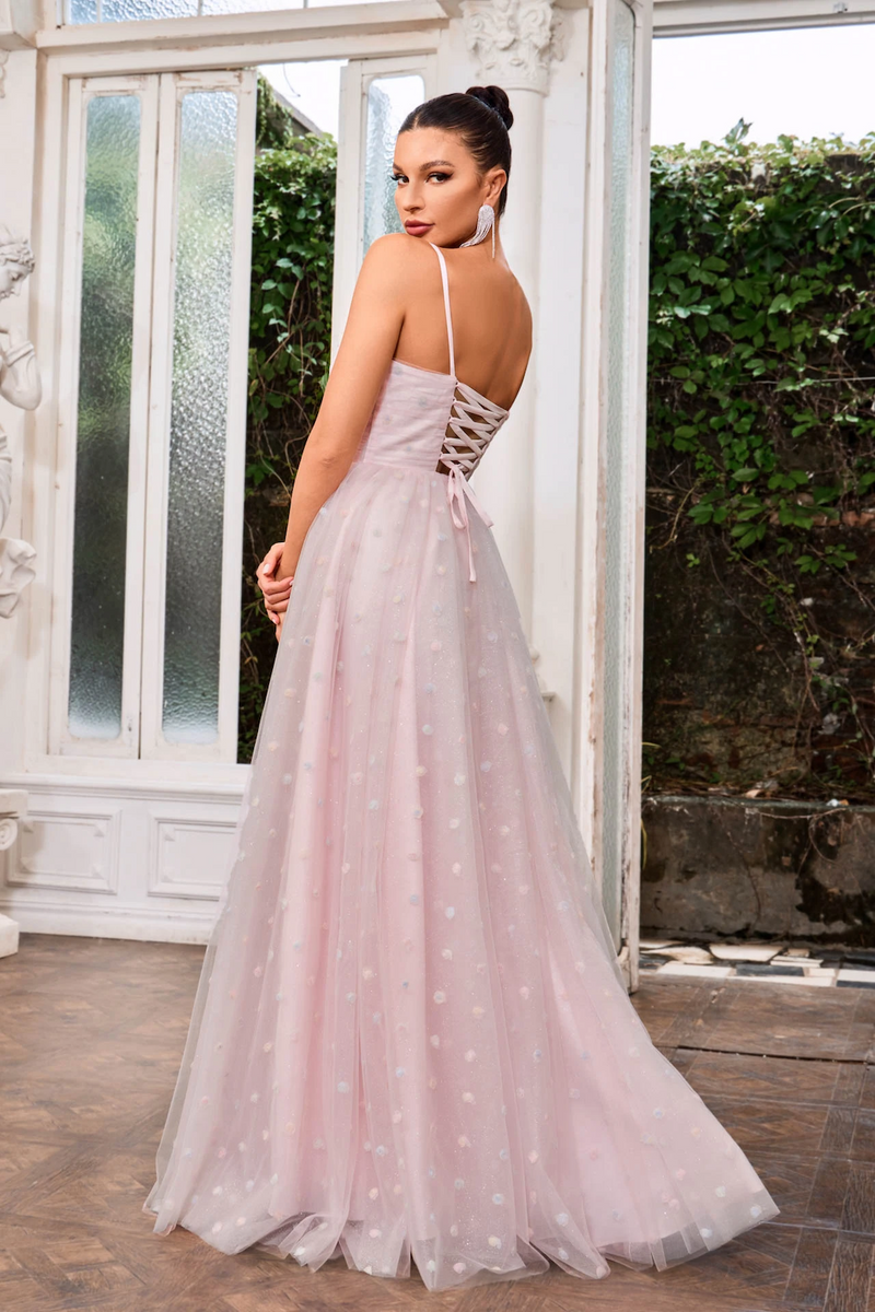 This dress features a v-neckline, spaghetti straps, tulle fabric with 3D floral details and a lace-up back. This dress is an excellent choice for your next prom or formal event.  JAD J24049