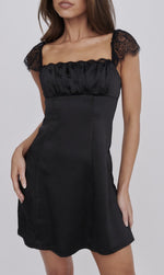 This cocktail dress features satin fabric with detailed lace sleeves and a square neckline. Style this dress to make it your own at your next homecoming or formal event.  ON 64312B