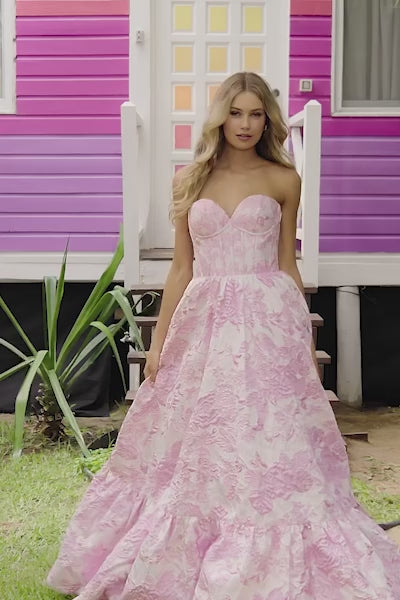 This Sherri Hill ballgown features a strapless neckline, brocade textured fabric and a corset bodice. This fabric is a statement and creates depth and interest. This could be the ideal choice for your next prom or formal event!  Sherri Hill 56055