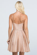This LU 25655 rose gold flowy short dress has pockets and shimmer fabric.