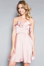 This MT 8921 cocktail dress in mauve features a ruffle on the bodice, a flowy skirt, and a strappy criss-cross back. 