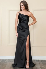 This simple one-shoulder gown with a delicate single strap with a high slit makes for the perfect prom dress. Pair this dress with strappy silver heels to complete your prom look.  PY 9030