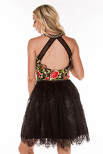 This black DJ 4338 two-piece cocktail dress has a floral bodice and tulle skirt.