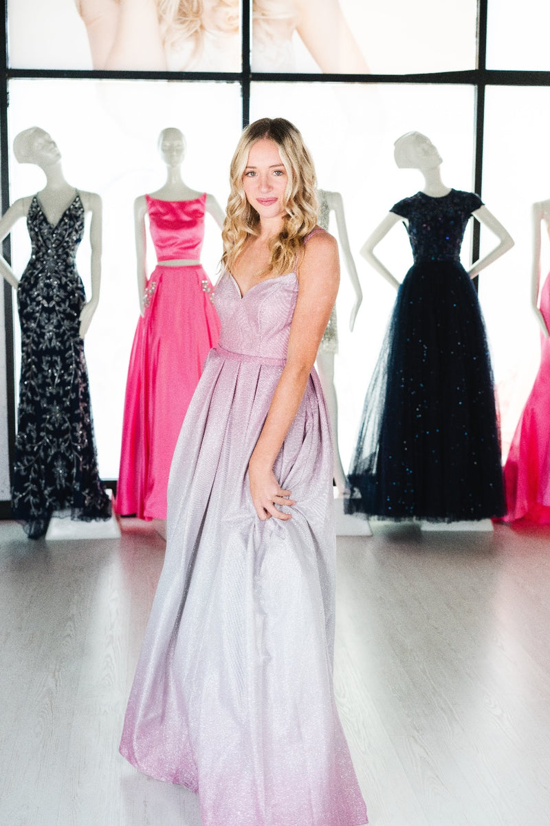 This DJ A9321 A-line shimmer ombre gown in pink features an open back and a sweetheart neckline.