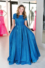 This MJS 19-262M A-line gown in royal features cap sleeves and a high neckline. 