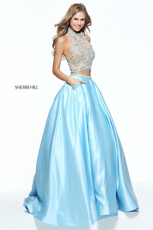 This Sherri Hill 51041 light blue two-piece ballgown has a halter and beaded bodice.