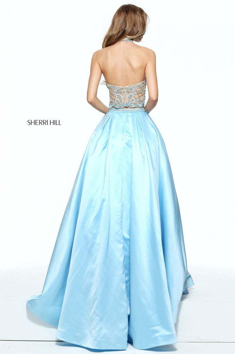 This Sherri Hill 51041 light blue two-piece ballgown has a halter and beaded bodice.