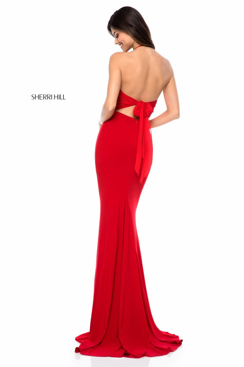This Sherri Hill 51844 gown in red features a lace appliqué halter bodice and a jersey skirt with an open back.