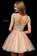 This Sherri Hill 52273 cocktail dress in nude/silver features a beaded bodice and a sequin tulle skirt.