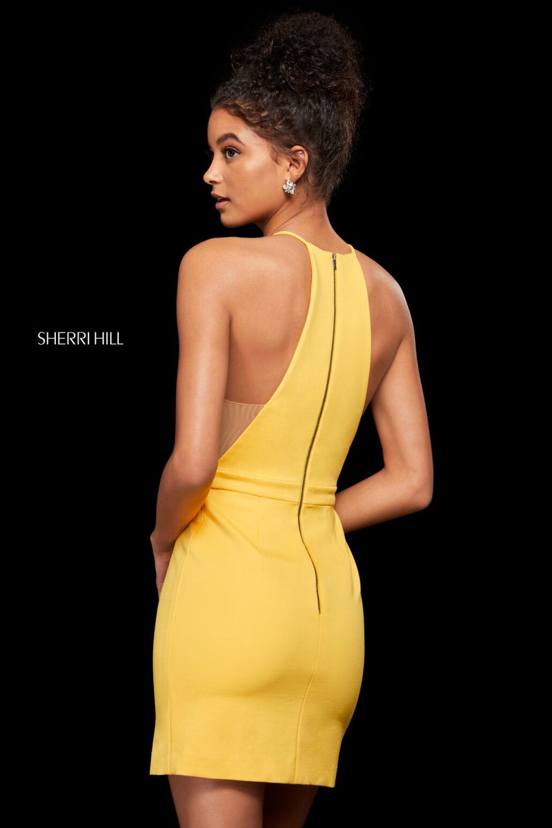 This Sherri Hill 53069 fitted cocktail dress in yellow features a halter neckline and a little side slit.