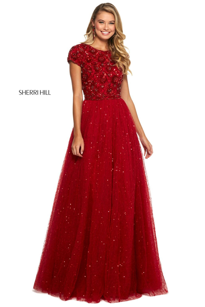 This Sherri Hill 53227 A-line gown in red features a high neck with a beaded bodice and an open back with a tulle shimmering skirt.