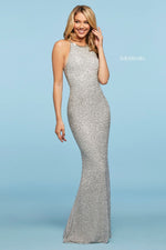 This Sherri Hill 53440 fitted gown in silver features a high cut halter style neckline and beading throughout. 