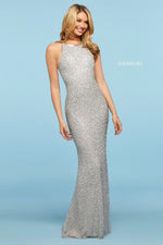 This Sherri Hill 53440 fitted gown in silver features a high cut halter style neckline and beading throughout. 
