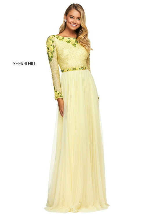 This Sherri Hill 53485 A-line gown in yellow features floral pattern sequins and a beaded bodice with long sleeves as well as a chiffon skirt. 